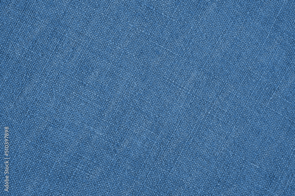 Blue woven surface close-up. Linen textile texture. Graceful color fabric background. Textured braided backdrop or wallpaper. Macro Blue woven surface close-up. Linen textile texture. Graceful color fabric background. Textured braided backdrop or wallpaper. Macro