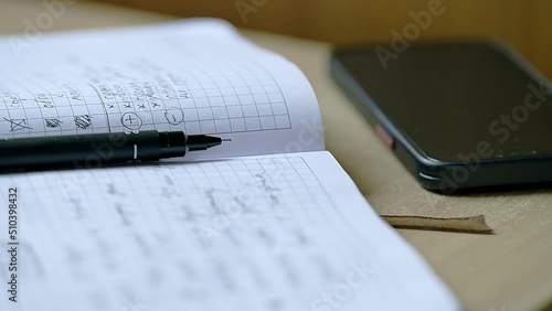 Closeup of a student's notebook with notes 