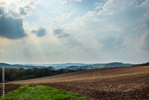 landscape with clouds and sunbeams near kreuzau photo