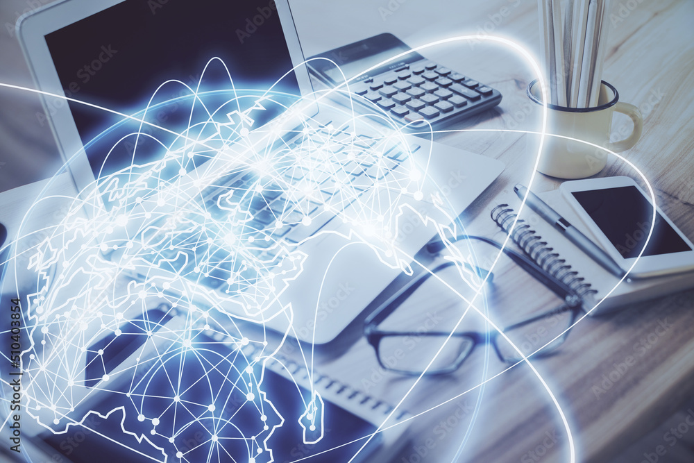 Double exposure of business theme icons and work space with computer background. Concept of success. Double exposure of business theme icons and work space with computer background. Concept of success.