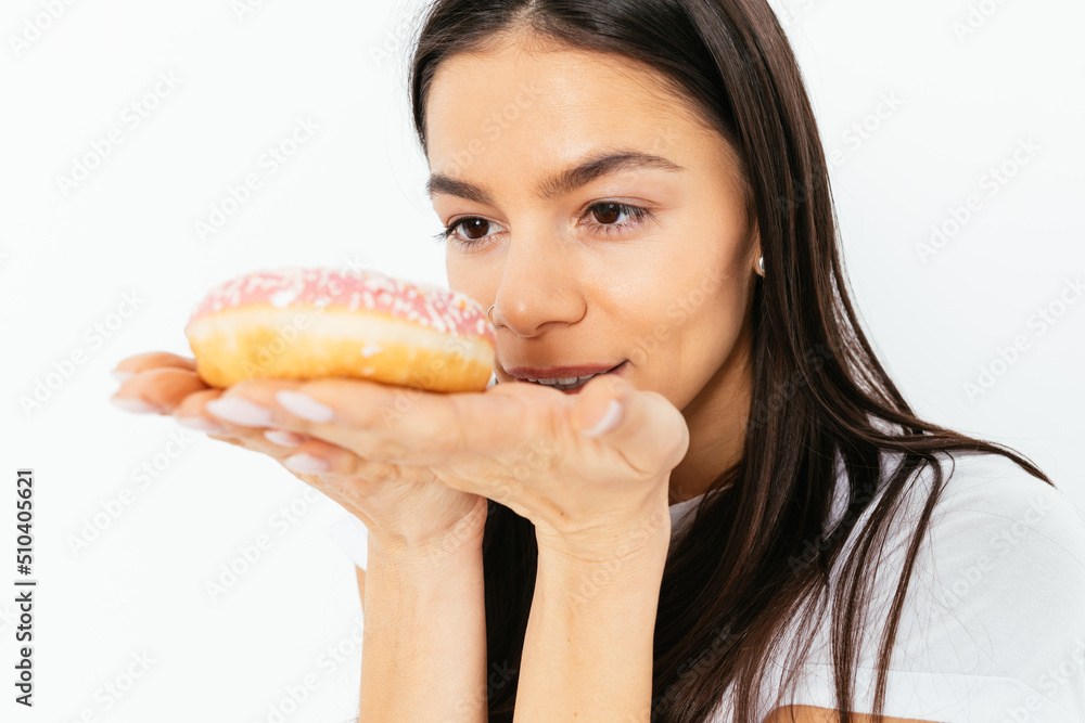 Portrait of young woman desiring to eat donut Portrait of young woman desiring to eat donut