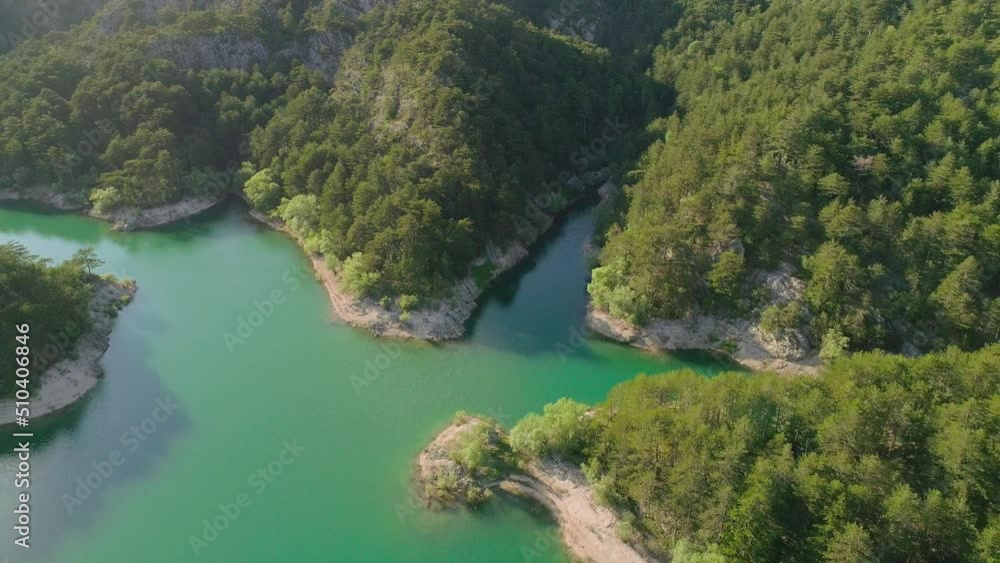 Aerial video of mountain lake and mountains at sunset Aerial video of mountain lake and mountains at sunset