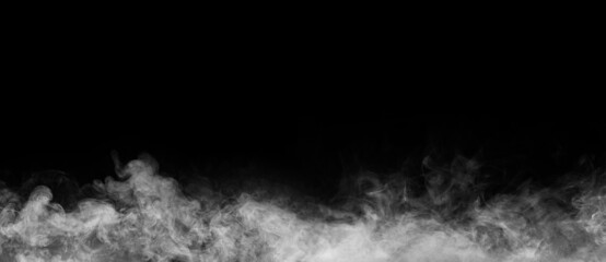 Abstract smoke texture frame over black background. Fog in the darkness. Natural pattern.
