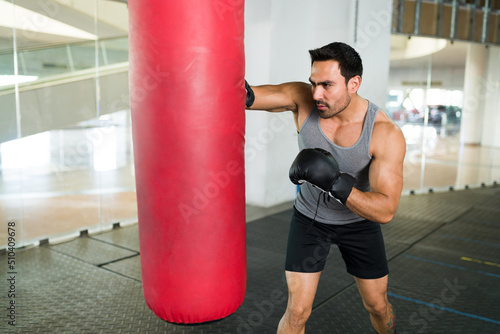 Attractive man practicing box at the gym © AntonioDiaz