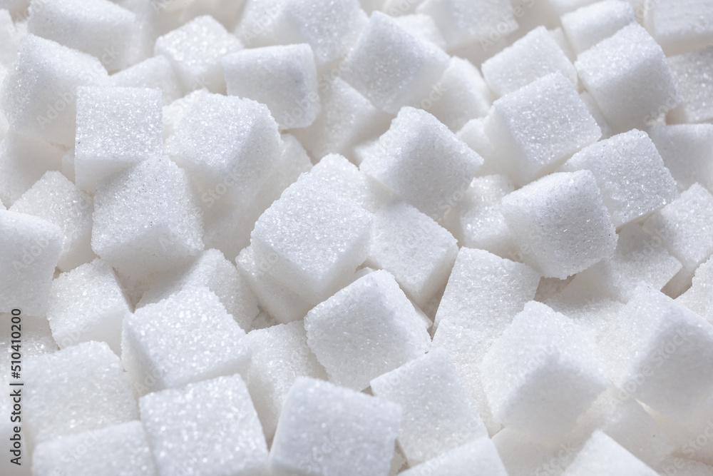 Rafinated sugar. Textured white background from sugar cubes. - obrazy, fototapety, plakaty 