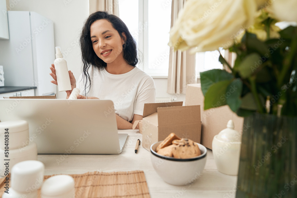 Friendly online store employee talking to customer via Skype Friendly online store employee talking to customer via Skype
