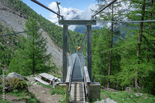 The Charles Kuonen Suspension Bridge in the Swiss Alps photo