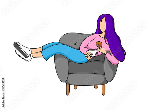 The girl drinks tea with cookies lying in a chair.