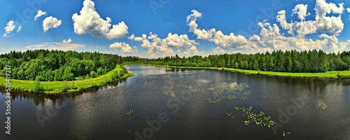 Panorama from the drone to the water reservoir among the forests of Podlasie.
