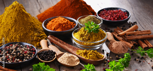 Fototapeta Naklejka Na Ścianę i Meble -  Variety of spices on kitchen table
