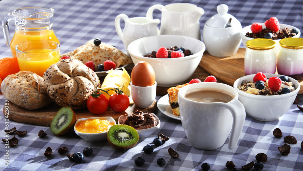 Breakfast served with coffee, juice, croissants and fruits Breakfast served with coffee, juice, croissants and fruits