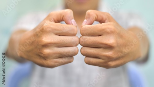 Hand of Asian elder man. Concept of rheumatoid arthritis, osteoarthritis, or joint pain