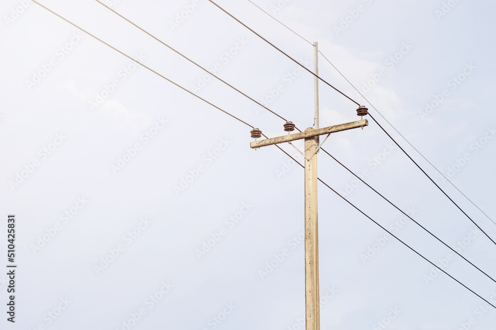 electric poles against the background of a bright blue sky electric poles against the background of a bright blue sky