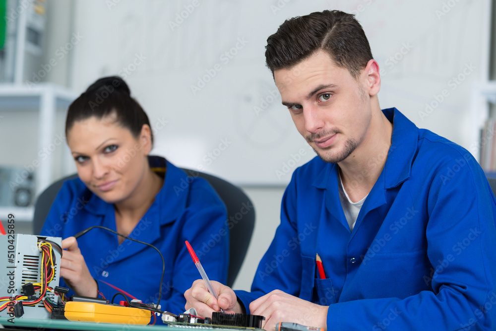 students in electronics class at university students in electronics class at university