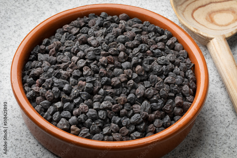 Bowl with black chickpea Murgia, ceci nero, also known by the name of cece del solco dritto in Italy Bowl with black chickpea Murgia, ceci nero, also known by the name of cece del solco dritto in Italy