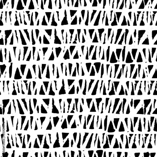 Black and white broken triangles surface pattern. 