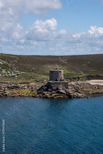 castle on Tresco island Isles of Scilly cornwall uk. Looking towards Tresco from Bryher  photo