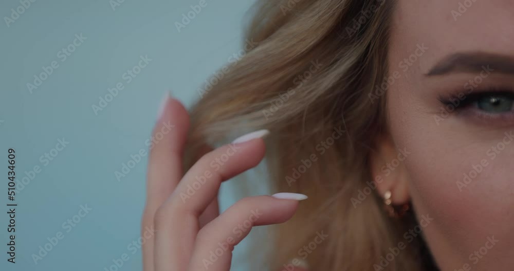 Closeup face of beautiful blond smiling woman. Gorgeous woman with attractive appearance Closeup face of beautiful blond smiling woman. Gorgeous woman with attractive appearance