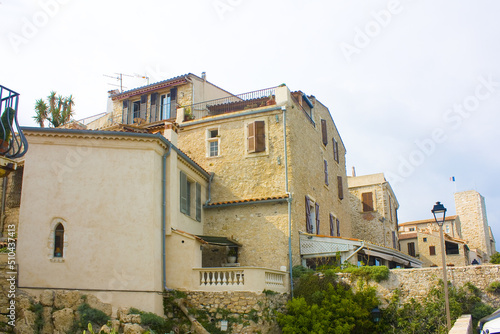 Picturesque architecture of the Old Town in Antibes, France  © Lindasky76