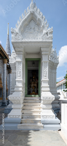 Phra Nakhon, Bangkok . June 11, 2022.  Wat Ratchapradit Sathitmahasimaram Rajawarawiharn .  Marble tiles, gilded teak & vivid mosaics at a grand 19th-century temple & royal monastery complex. photo