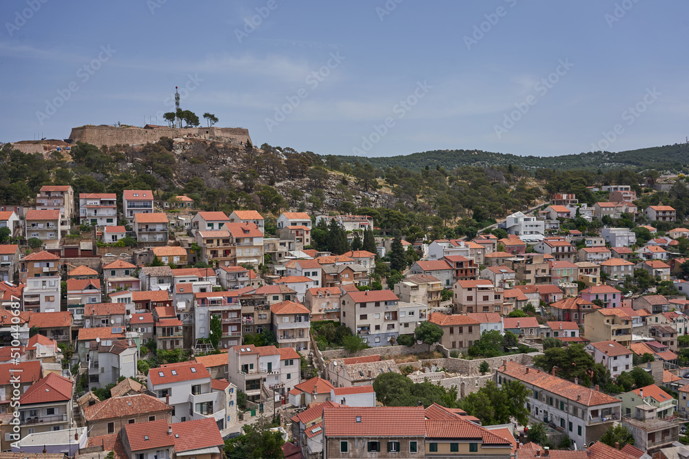 Sibenik, Croatia - May 26, 2022 - View of the town of Sibenik from the St. Michael's Fortress on a sunny spring afternoon