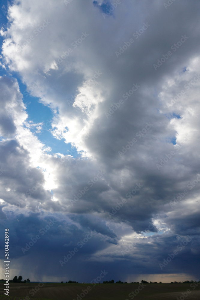 Fototapeta premium Clouds on the blue sky in sunlight.