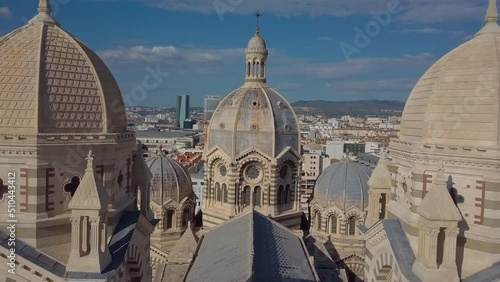 Close up pull back and forward drone shot of an impressive cathedral in Marseille, France. High quality 4k footage