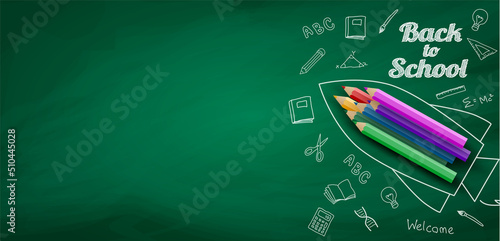 Welcome back to school. design with pencil and hand drawn on chalkboard. Vector.