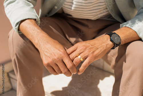 Close-up of African American male hands. Male hands with ring and watch. Human body concept