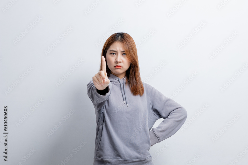 Portrait of a beautiful Asian woman gesturing on isolated background, portrait concept used for advertisement and signage, isolated over white background, copy space. Portrait of a beautiful Asian woman gesturing on isolated background, portrait concept used for advertisement and signage, isolated over white background, copy space.
