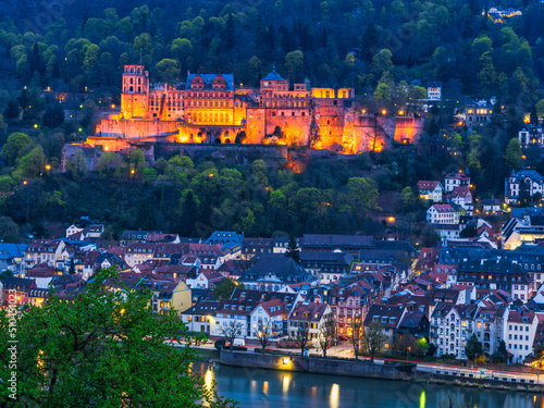 Long exposure landscape shot of Heidelberg old town and Palace illuminated in Germany