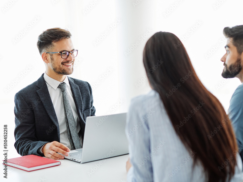 young couple agent lawyer meeting office house agreement document deal contract real estate investment young couple agent lawyer meeting office house agreement document deal contract real estate investment