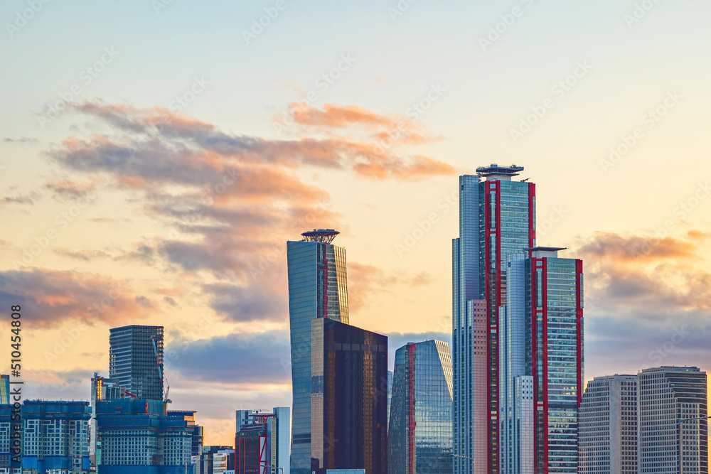 Fototapeta premium Cityscape of Yeouido skyscrapers in the business financial district taken in the evening sunset time in Seoul, South Korea