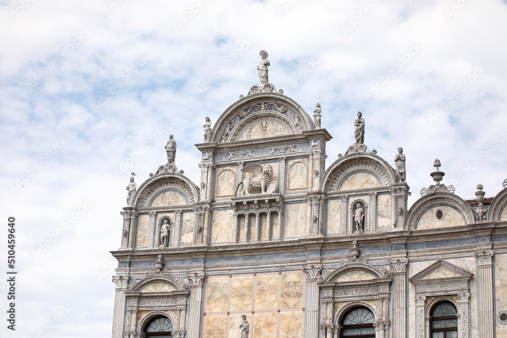 Beautiful marble facade of The St. John and Paul hospital in Venice. Close-up of decorated grand hospital.