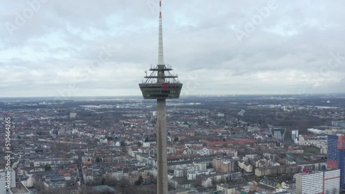 Forwards fly to ring on Colonius telecommunications tower. Former restaurant and lookout platform high above city. Cologne, Germany photo