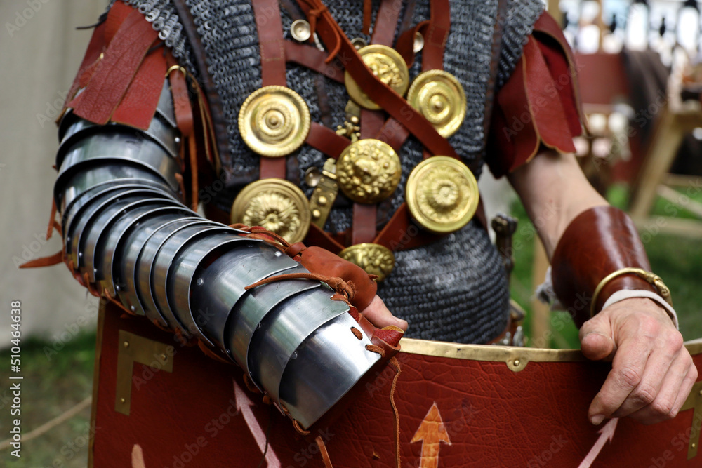Φωτογραφία Legionary of Ancient Rome, close up of armor and scutum of infantry of Roman arm