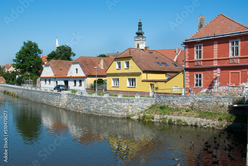 Sobeslav, Czech Republic: River embankment with old colorful houses.