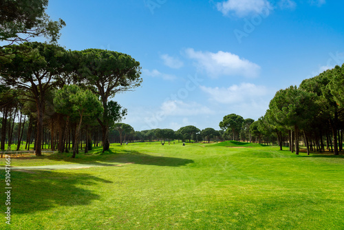 Scenic panoramic view of golf fairway at the golf course