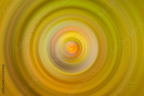 Circular blur in yellow and green tones