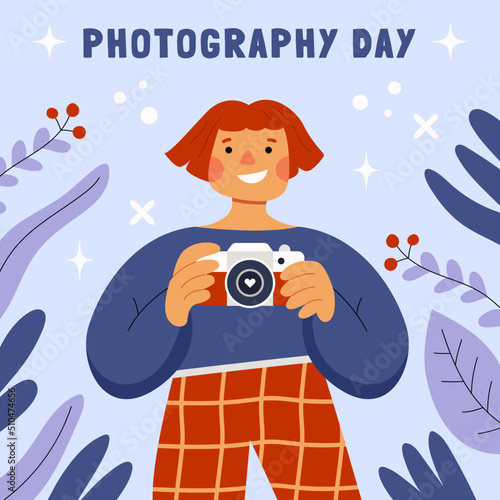 Girl taking a photo. Redheaded smiling female photographer holding a camera. Blue floral background, leaves and flowers. World photography day. Flat hand drawn cartoon vector illustration