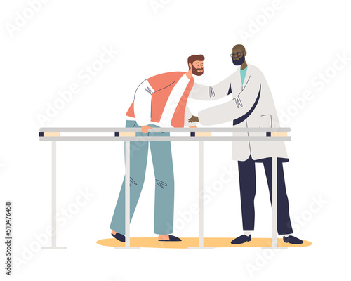 Doctor helping patient to walk after injury or medical operation at physio therapy rehabilitation