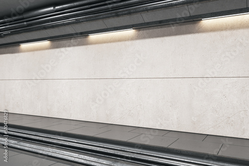 Perspective view on blank light grey wall for advertising billboard behind rails in abstract empty underground area with lights on top. 3D rendering, mockup
