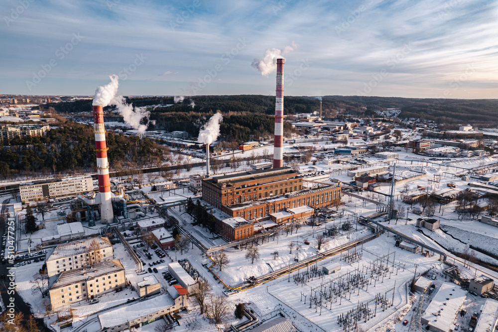 Obraz na płótnie aerial view of the industrial heating infrastructure view in vilnius city in winter, lithuania w salonie