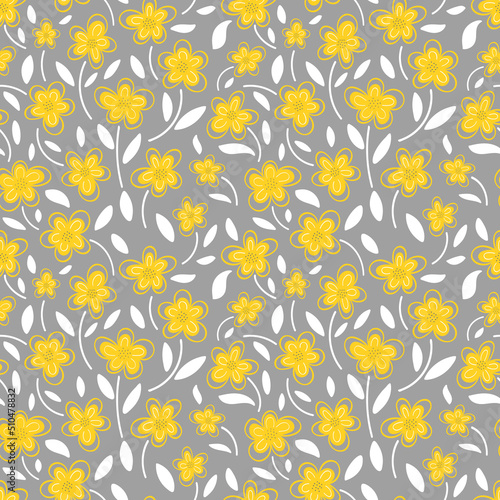 Yellow flowers of daisies on a gray background is a seamless pattern.