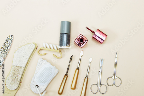 manicure and pedicure equipment for nail bar set on pink background top view mockup
