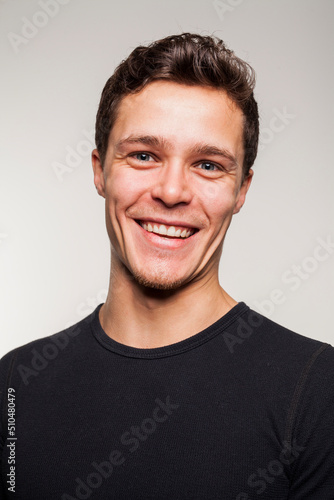 Portrait of young man in black shirt