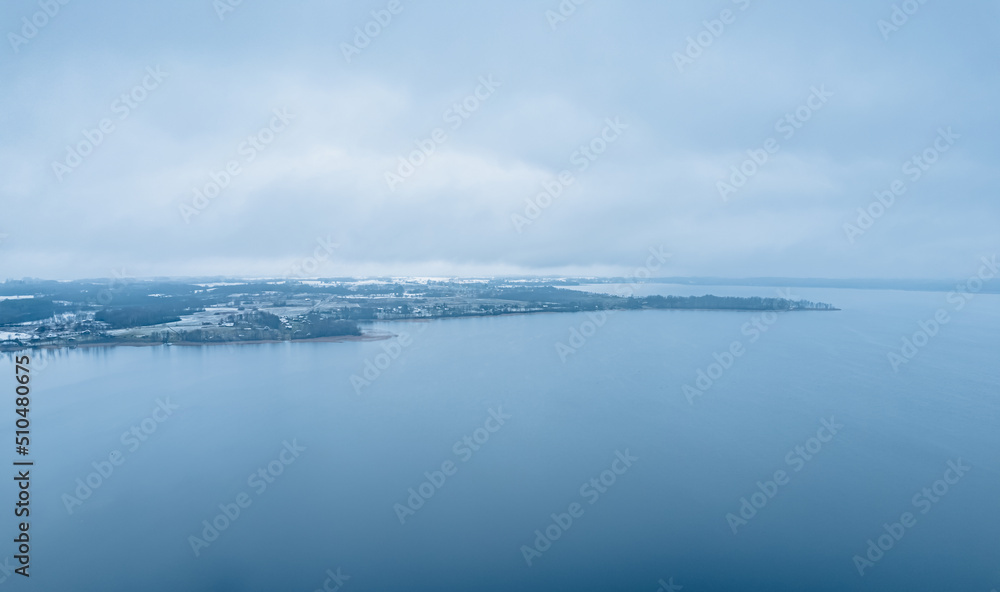 blue lake water and clouds in lithuania blue lake water and clouds in lithuania