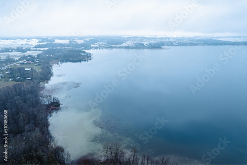 blue lake water and clouds in lithuania