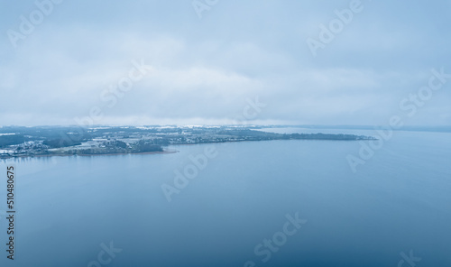 blue lake water and clouds in lithuania © Aurelijus
