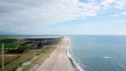 aerial view along the endless beaches on the coast of denmark and jutland  Vrist with view towards Vejlby Klit  Ferring S   and the Bovbjerg Fyr in summer  Lemvig  Denmark 